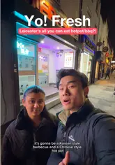 Here are a few SEO-friendly alt text options, all under 125 characters:

**Option 1 (Descriptive & Keyword rich):**
Tables full of hot pot, BBQ meats, and sushi at Yo! Fresh buffet restaurant in Leicester.

**Option 2 (Action-oriented):**
Diners enjoying an all-you-can-eat hot pot and BBQ feast at Yo! Fresh on Welford Road, Leicester.

**Option 3 (Concise):**
Variety of hot pot ingredients, BBQ dishes, and sushi served at Yo! Fresh Leicester buffet.