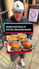 A creator reviews smash burgers at 'That Burger Place' located inside the Ape & Apple pub in Manchester, highlighting the quality of the buns and the spicy chilli burger.