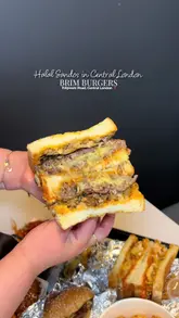 A short, punchy video showcasing various menu items from Brim Burgers on Edgware Road, including sandos, beef burgers, chicken tenders, and cheesy tater tots.