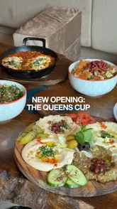 A review of The Queen's Cup, a new Arabic-inspired cafe in Withington, Manchester. The video features the creator introducing the venue, followed by shots of various brunch dishes, mezze platters, specialty drinks, and the interior decor.