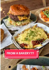 The creator visits The Crown in Codsall, a pub that has partnered with Medicine Bakery to offer a street food menu. The video features a tour of the beer garden and interior, followed by a review of various dishes including a smash burger, pizza, cauliflower wings, sausage roll, lasagna fries, and a dessert.