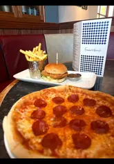 A mother and daughter visit a Frankie & Benny's restaurant for a pre-cinema lunch, highlighting the nostalgic atmosphere, the menu, and current promotional offers.