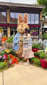 A montage video showcasing various elaborate floral displays across Chelsea and Belgravia as part of a flower festival. The creator visits multiple locations, posing with the installations, which feature themes like fairytales and space.