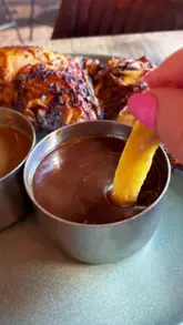 A review of the new menu at Spitroast Kitchen, featuring rotisserie chicken, bread and dips, and a kids' meal.