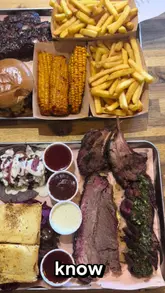 A review of a Texas BBQ smokehouse in London, featuring a large meat platter including brisket, ribs, and a smash burger.