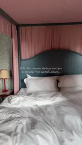 A short, aesthetic montage showcasing the interiors of The Mitre Hotel, including the bedroom, bathroom, and river views, alongside shots of drinks and food.