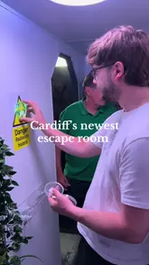 A vlog-style video showcasing a new space-themed escape room experience in Cardiff called 'Going Up' at Puzzled Cardiff, featuring the creators interacting with various puzzles and controls.