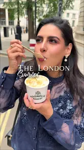 A creator visits the Magnolia Bakery pop-up at Cafe Ciel in Raffles London to try their viral banana pudding. The video features the creator tasting the dessert, showing the stall, and highlighting the queue, effectively building hype around the limited-time offering.