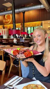 A creator visits Bandibul in Manchester to try Korean BBQ for the first time, showcasing the interactive dining experience, the set menu, and the delicious marinated meats.
