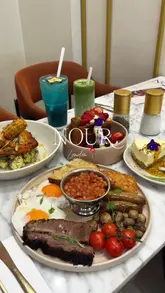 A short, aesthetic montage showcasing the brunch menu and drink preparation at Nour Cafe in Walthamstow, featuring a variety of dishes like french toast, brisket, and matcha lattes.