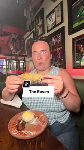 A vlog-style review of The Raven in Glasgow, highlighting its sports-focused atmosphere, food menu, and unique dessert offerings like the deep-fried Mars bar.