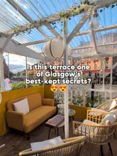 A creator visits Walnut Bar & Restaurant in Glasgow's West End, highlighting its covered terrace, cozy interior, and menu featuring Persian and Turkish cuisine, including meze platters, mixed grills, and desserts.