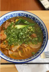 A short, engaging review of JWD Hand-Pulled Noodle Bar in Canary Wharf, showcasing their hand-pulled noodle soup and Rougamo (Chinese hamburger).
