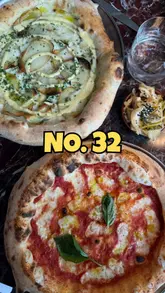 A review-style video featuring a new pizza restaurant in Sunderland called No. 32. The creator introduces the venue, shows the interior, and highlights various dishes including Neapolitan-style pizzas, cocktails, sides, and desserts like tiramisu and churros.