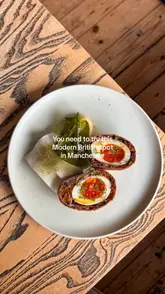 A food review of Restaurant Örme in Urmston, Manchester, highlighting their shift from tasting menus to sharing plates. The video features close-ups of various dishes including a Scotch egg, bread with Marmite butter, beef tartare, lamb, trout, and desserts, accompanied by a voiceover recommendation.