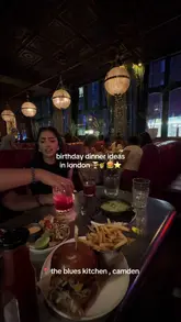 A short, energetic video showcasing a birthday dinner experience at The Blues Kitchen in Camden, featuring shots of the interior, food, drinks, and live music.