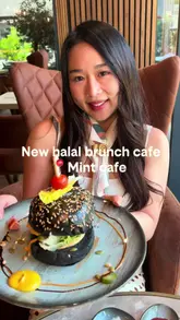 A vlog-style review of Mint Cafe, a halal brunch spot near South Acton. The video features a tour of the interior, a look at the menu items including a wagyu burger, steak sandwich, and pancakes, and the creator's honest review of the experience.