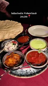 A personal review of an Indian restaurant called Jalori in Woburn Sands, featuring a variety of dishes including lamb chops, curries, and naan, with a focus on the halal menu options.