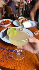 A fast-paced review of Industry Bar in Nottingham, highlighting their new food and drink menu, including cocktails like the Shark Attack and Pineapple Daiquiri, as well as tacos and buffalo wings.