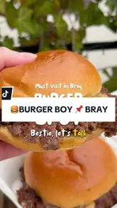 A short, energetic review of Burger Boy in Bray, featuring close-ups of their smash burgers and rosemary sea-salted fries, highlighting the venue as a go-to spot for a casual meal.