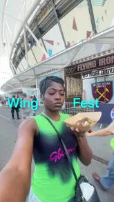 A first-person vlog capturing a visit to Wing Fest UK, featuring tastings from various chicken wing vendors and a doughnut stall, showcasing the festival atmosphere and food variety.