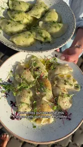 A short, engaging video highlighting the weekly 'pierogi club' at Three Quarters Kitchen. The video features a mix of behind-the-scenes footage showing the handmade preparation of the dumplings and close-up shots of the final plated dishes, accompanied by a voiceover explaining the concept.