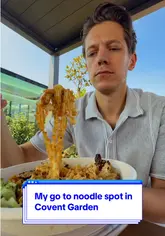A creator reviews a Taiwanese noodle spot in Covent Garden, showcasing the takeaway packaging and the chicken noodle dish while providing a personal recommendation.