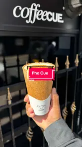 A short vlog-style video showcasing a unique Vietnamese iced creme brulee coffee served in an edible waffle cup at Pho Cue in Manchester.