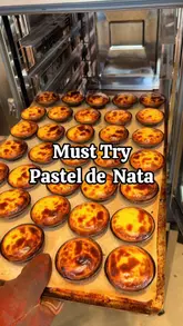 A short, energetic video showcasing the production process and final product of Pastel de Nata at Santa Nata in Covent Garden, including a taste test of the tarts, a sundae, and a latte.