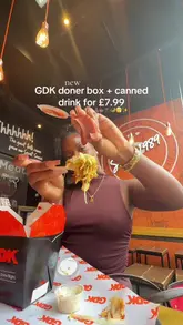 A promotional vlog featuring a creator reviewing a £7.99 meal deal at German Doner Kebab, showcasing the food, the ordering process, and the value proposition.