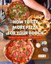 A high-quality, overhead food photography shot featuring three distinct pizzas on a wooden table, likely from a restaurant review. The lighting is bright and even, highlighting the textures of the crust and toppings.