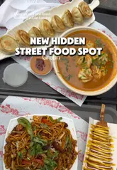 A fast-paced tour of Newham Food Village in East London, showcasing a wide variety of street food vendors and dishes, including dumplings, noodles, Korean corn dogs, and traditional Bangladeshi cuisine.