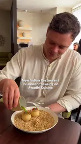 A review of Oudh 1722, a new Indian restaurant in London focusing on Awadhi cuisine, featuring dishes like oxtail biryani, kebabs, and a chocolate dessert.