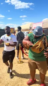 A high-energy vlog showcasing various food vendors at the Ghana Party in the Park festival, highlighting dishes like waakye, jerk chicken, jollof rice, and Ghanaian cake with custard.