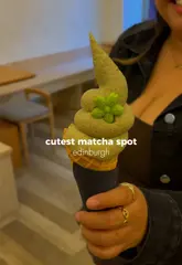 A short, energetic montage showcasing Yuzu, a cafe in Edinburgh, highlighting their matcha-based desserts and drinks, including cheesecake and soft-serve ice cream.