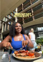 A short, energetic reel featuring a breakfast visit to Caravan City in London, highlighting their brunch menu, refreshing spritzes, and outdoor seating area.