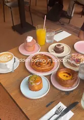 A short, engaging reel showcasing a bakery called Heidi, featuring shots of the exterior, the pastry display, and a creator sampling various sweet treats and pastries alongside coffee.