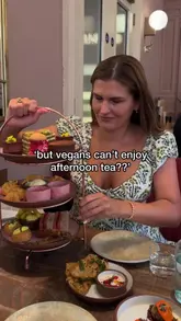 A couple reviews the new vegan afternoon tea at Mallow in London Bridge, showcasing the variety of savoury and sweet items included in the set.