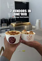 A promotional video for Hungr Hub in Dublin, highlighting the variety of vendors available, including Crumble Crown, Lume, Dos Burritos, and Tuckk Inn. The video features a tour of the space, close-ups of the food preparation, and a review of the offerings.
