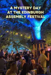 A vlog-style video showcasing a day at the Edinburgh Assembly Festival, featuring circus performances, cocktails, and various food truck options.