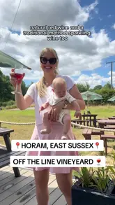 A couple documents their day out, combining a scenic 1 hour 45 minute walk with a stop at Off The Line Vineyard in East Sussex. The video showcases the walking trail, the vineyard's outdoor seating area, live music, and the food and drink options available, including charcuterie boards and pizza.