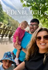 A family vlog showcasing a day out at Edinburgh Zoo, highlighting animal exhibits, the dinosaur and brick trails, the on-site restaurant, and practical tips for families like stroller hire and navigating the hilly terrain.