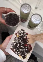 A fast-paced, montage-style reel showcasing the diverse food and drink offerings at a wedding, including mocktails, appetizers, main courses, and a variety of dessert stalls.