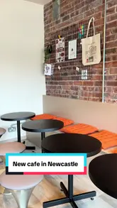 A short, fast-paced video showcasing the interior, coffee preparation, and menu items of a new cafe called Coco & Co. in Newcastle.