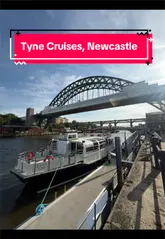 A first-person vlog showcasing a new boat cruise experience on the River Tyne in Newcastle, highlighting the boat's interior, the scenic views of the bridges, and the onboard amenities.