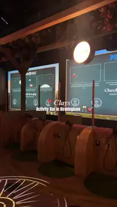 A short, energetic vlog showcasing a visit to Clays, an activity bar in Birmingham. The video features clips of the shooting range games, the bar area, and cocktails being prepared and enjoyed.