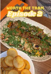 A vlog-style review of Remal, a Lebanese restaurant in Prestwich, Manchester, featuring a variety of dishes including hummus, baba ganoush, and a mixed grill platter.