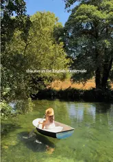 A visually stunning montage showcasing a countryside estate stay, featuring riverside shepherd's huts, wood-fired hot tubs, and outdoor activities like boating and sauna use.