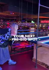 A high-energy vlog showcasing Roxy Ball Room and Roxy Lanes as an ideal pre-gig venue, highlighting the combination of games, casual food, cocktails, and app-based offers.