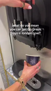 A short, handheld video showcasing the process of dispensing and topping frozen yogurt at the Go Greek shop in London.